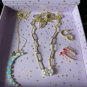 New Melinda Marie gold variety box. 2 necklaces and 2 earrings.